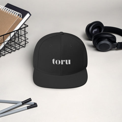 The toru Snapback Hat