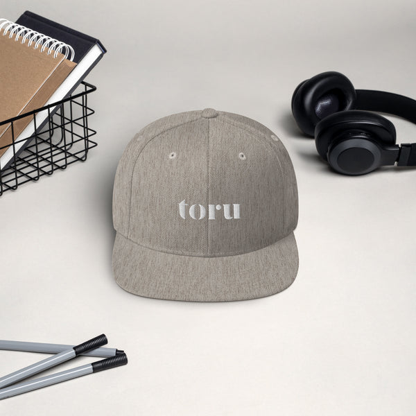 The toru Snapback Hat