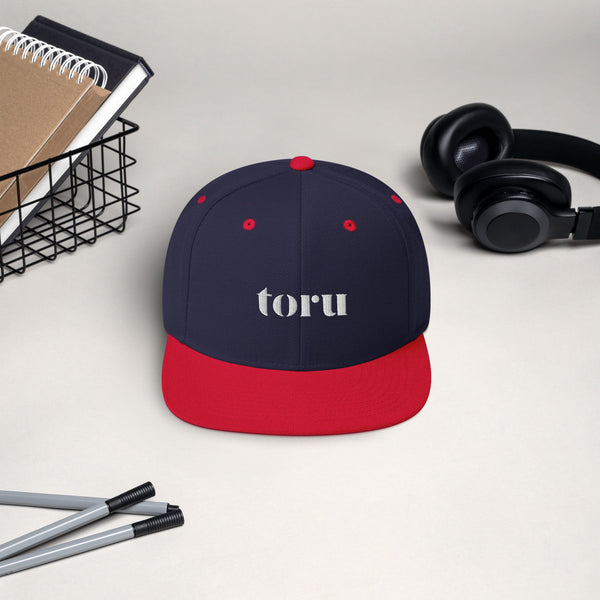 The toru Snapback Hat